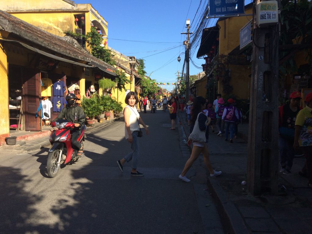 Busy street with tourists in Hoian